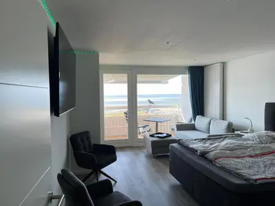 Ein Bett oder Betten in einem Zimmer der Unterkunft Ferienwohnung Sea View