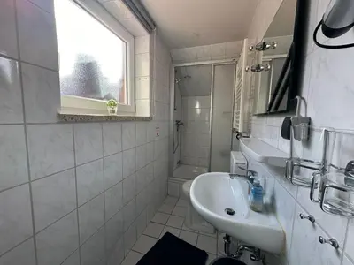 Ein Badezimmer in der Unterkunft Haus Sonneneck 4