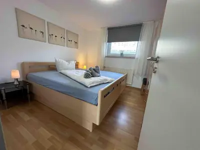 Ein Bett oder Betten in einem Zimmer der Unterkunft Haus Sonneneck 4