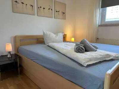 Ein Bett oder Betten in einem Zimmer der Unterkunft Haus Sonneneck 4