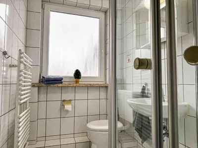 Ein Badezimmer in der Unterkunft Haus Sonneneck 2
