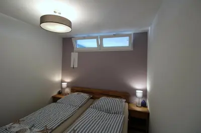 Ein Bett oder Betten in einem Zimmer der Unterkunft Panorama Whg 101, 7 OG