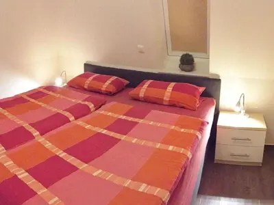 Ein Bett oder Betten in einem Zimmer der Unterkunft Holiday home for 4 people in Cuxhaven