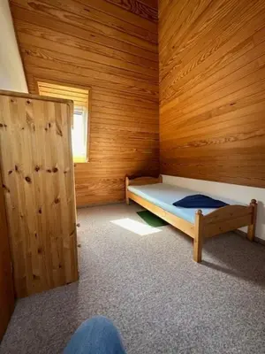 Ein Bett oder Betten in einem Zimmer der Unterkunft Kampweg 1 Wohnung 2