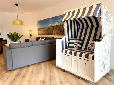 Ein Sitzbereich in der Unterkunft Haus Nordseebrandung FeWo 8