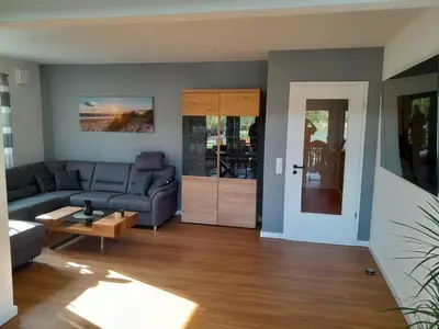 Ein Sitzbereich in der Unterkunft Exklusives Haus am See