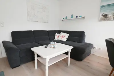 Ein Sitzbereich in der Unterkunft Nordseestube