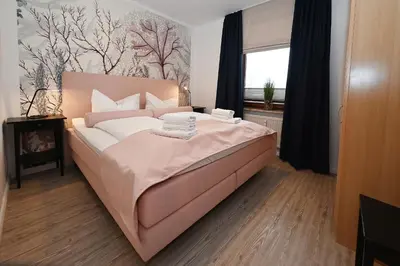 Ein Bett oder Betten in einem Zimmer der Unterkunft Westgatt