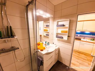 Ein Badezimmer in der Unterkunft Ferienwohnung Duhnenzauber in Cuxhaven Duhnen