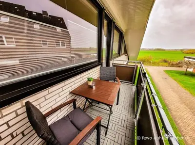 Ein Balkon oder eine Terrasse in der Unterkunft Ferienwohnung Duhnenzauber in Cuxhaven Duhnen