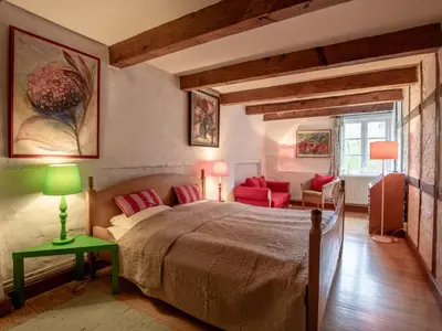 Ein Bett oder Betten in einem Zimmer der Unterkunft Holiday Home Gut Hörne-1 by Interhome