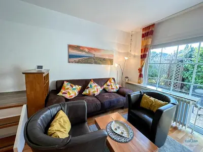Ein Sitzbereich in der Unterkunft Ferienhaus Blinkfüür Duhnen