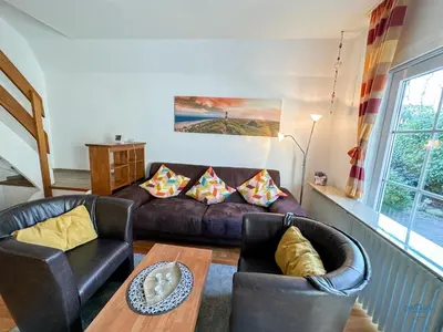 Ein Sitzbereich in der Unterkunft Ferienhaus Blinkfüür Duhnen