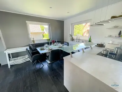 Ein Sitzbereich in der Unterkunft Ferienhaus Lindenweg Bad Bederkesa