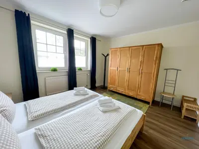 Ein Bett oder Betten in einem Zimmer der Unterkunft Landhaus Rosenhof Wohnung 1