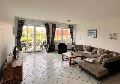 Ein Sitzbereich in der Unterkunft Ferienwohnung Deichbrise