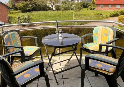 Ein Balkon oder eine Terrasse in der Unterkunft Ferienwohnung Deichbrise