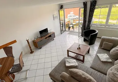 Ein Sitzbereich in der Unterkunft Ferienwohnung Deichbrise