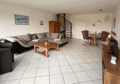 Ein Sitzbereich in der Unterkunft Ferienwohnung Deichbrise