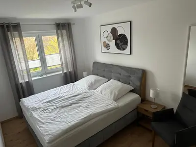 Ein Bett oder Betten in einem Zimmer der Unterkunft Lenis Deichblick