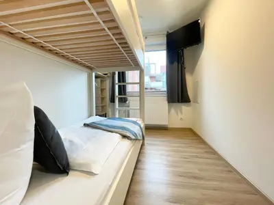 Ein Bett oder Betten in einem Zimmer der Unterkunft Seaside 53 FeWo 6