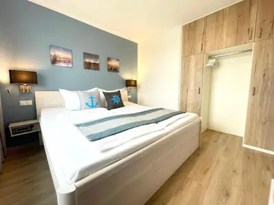 Ein Bett oder Betten in einem Zimmer der Unterkunft Seaside 53 FeWo 6