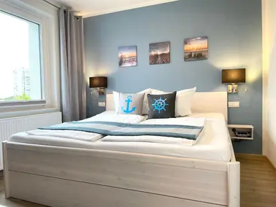 Ein Bett oder Betten in einem Zimmer der Unterkunft Haus Wernerwald FeWo 6