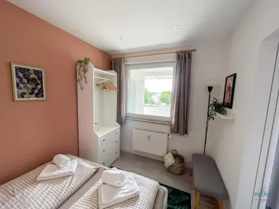 Ein Bett oder Betten in einem Zimmer der Unterkunft Kugelbakeblick 51