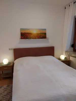 Ein Bett oder Betten in einem Zimmer der Unterkunft FW Steingraf Waldblick