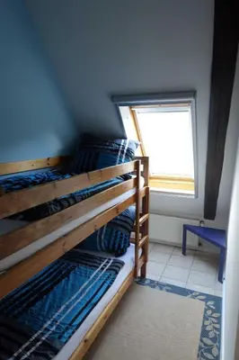 Ein Bett oder Betten in einem Zimmer der Unterkunft Urlaub auf dem Janssenhof