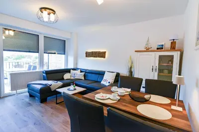 Ein Sitzbereich in der Unterkunft Haus Seaside 53 SEA4