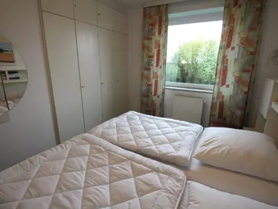 Ein Bett oder Betten in einem Zimmer der Unterkunft Residenz Atlantic mit Hallenbad und Sauna