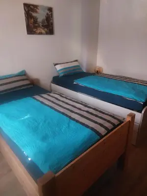 Ein Bett oder Betten in einem Zimmer der Unterkunft Ferienwohnung im Grünen