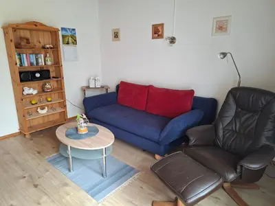 Ein Sitzbereich in der Unterkunft Ferienwohnung im Grünen