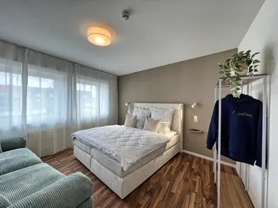 Ein Bett oder Betten in einem Zimmer der Unterkunft Gemütliche helle Ferienwohnung im angesagten Boho Stil #Cosiness Company