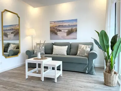 Ein Sitzbereich in der Unterkunft Haus Nordseebrandung FeWo 3