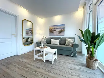 Ein Sitzbereich in der Unterkunft Haus Nordseebrandung FeWo 3