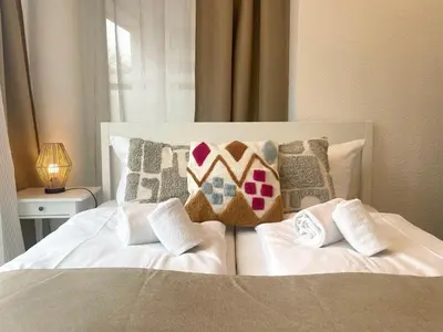 Ein Bett oder Betten in einem Zimmer der Unterkunft Haus Nordseebrandung FeWo 3