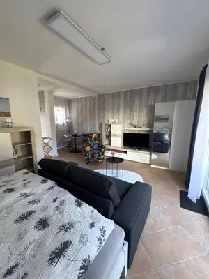 Ein Sitzbereich in der Unterkunft Haus Sandbank