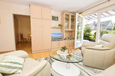 Ein Sitzbereich in der Unterkunft Haus Birte