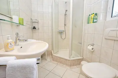 Ein Badezimmer in der Unterkunft Haus Birte