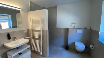 Ein Badezimmer in der Unterkunft SD11 Hindenburg App 1