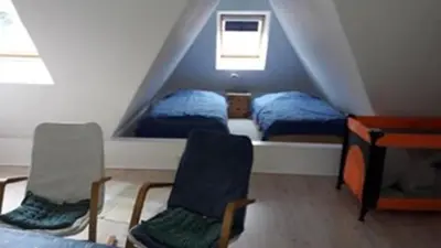 Ein Bett oder Betten in einem Zimmer der Unterkunft FEWO Wald&Meer