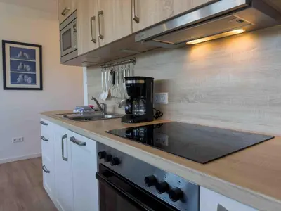 Küche/Küchenzeile in der Unterkunft Elegantes Apartment Ankerplatz Duhnen