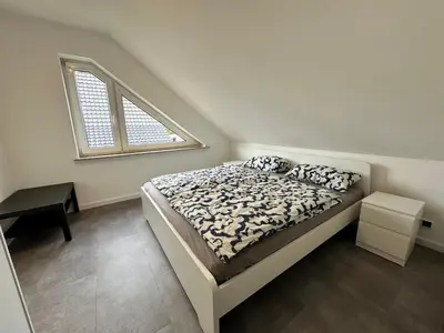 Ein Bett oder Betten in einem Zimmer der Unterkunft Nordsee Oase