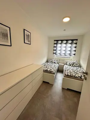 Ein Bett oder Betten in einem Zimmer der Unterkunft Nordsee Oase