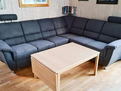 Ein Sitzbereich in der Unterkunft 12 person holiday home in Otterndorf