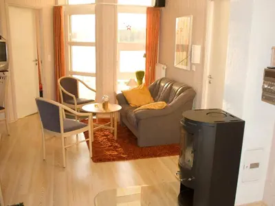 Ein Sitzbereich in der Unterkunft 12 person holiday home in Otterndorf