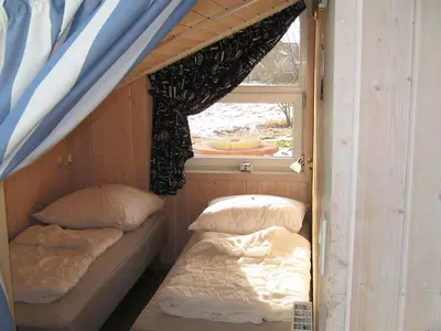 Ein Sitzbereich in der Unterkunft 12 person holiday home in Otterndorf