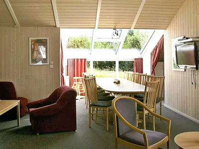 Ein Sitzbereich in der Unterkunft 12 person holiday home in Otterndorf